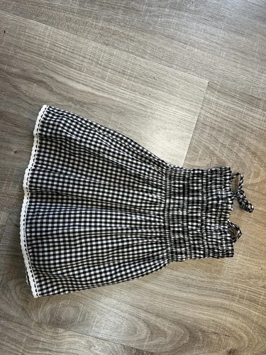 Top a bretelles a carreaux noir