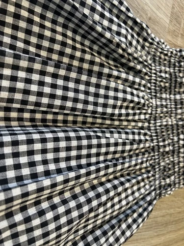 Top a bretelles a carreaux noir